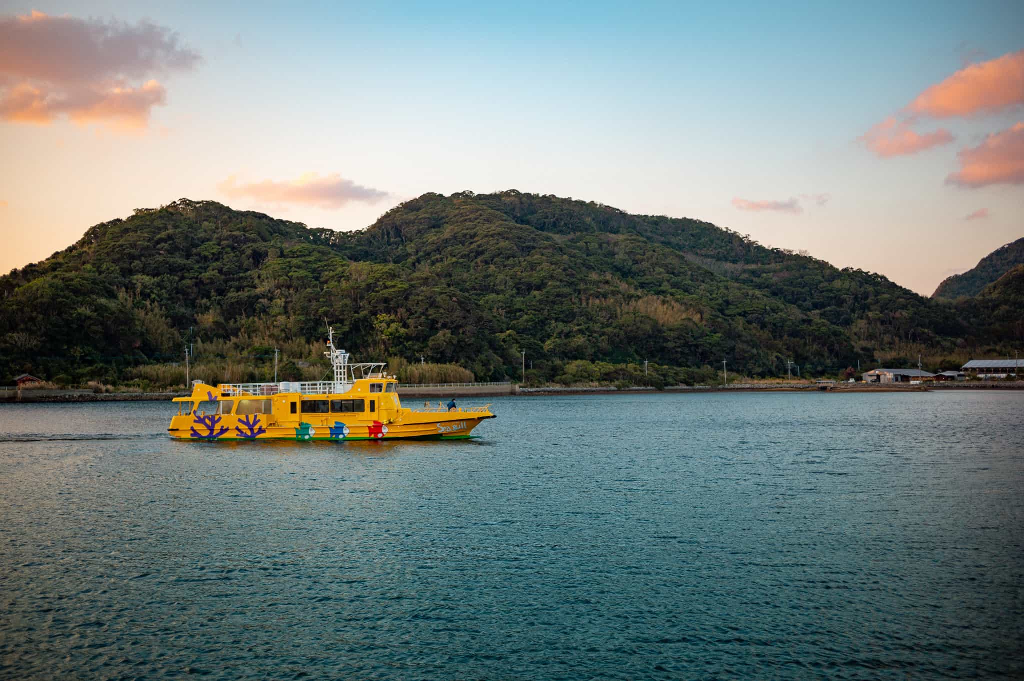 ferry boat approaching hisaka island in the goto islands